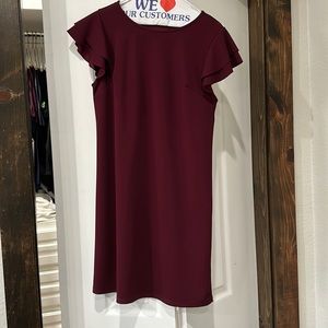 Burgundy knee length dress with flutter sleeves